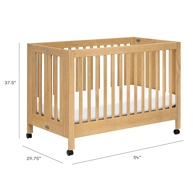 babyletto Maki 2-in-1 Portable Folding Crib with Toddler Bed Conversion Kit in Honey, Greenguard Gold Certified