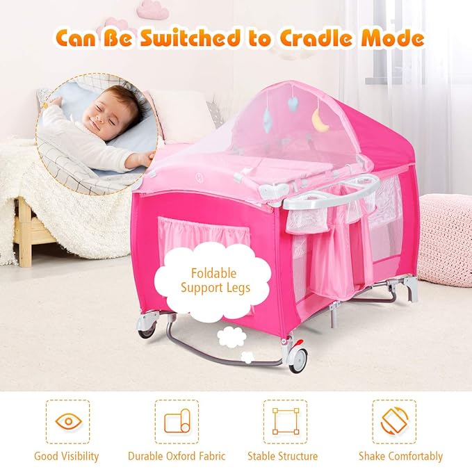 Costzon 4 in 1 Pink Pack and Play with Bassinet, Portable Baby Playard with Adjustable Canopy, Side Zipper Entrance, Music Box, Wheels/Brake, Foldable Infant Pink Bassinet for Baby Girl Toddlers