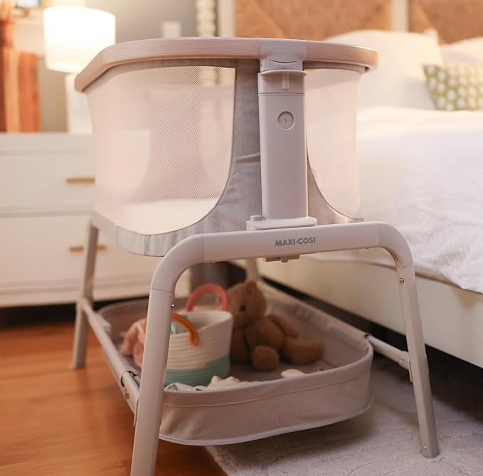 Maxi-Cosi Iora Baby Bassinets Bedside Sleeper, Portable Bassinet, Infant Bedside Sleeper Crib, Height Adjustable, Breathable Mesh, Large Storage Basket, Classic Graphite