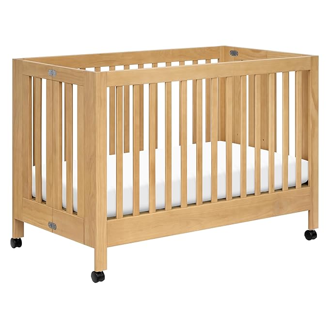 babyletto Maki 2-in-1 Portable Folding Crib with Toddler Bed Conversion Kit in Honey, Greenguard Gold Certified