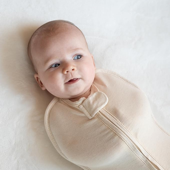 Woombie Original Baby Swaddling Blanket - Soothing, Cotton Zippered Swaddle - Wearable Newborn Blanket, Mint Alphabet, 14-19 lbs