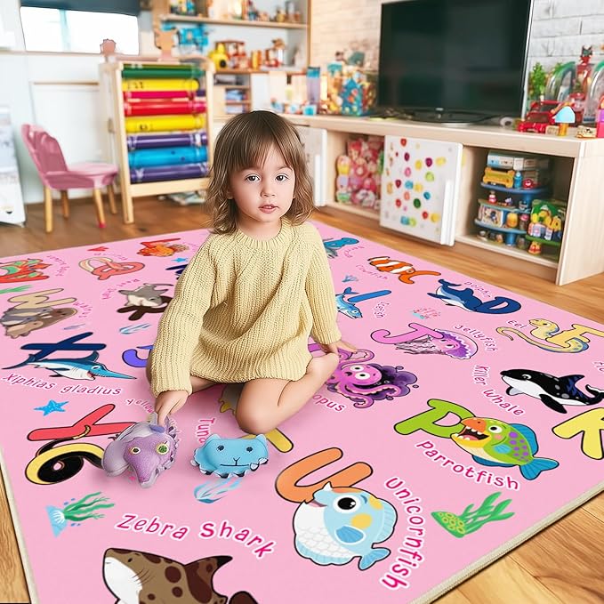 Kids Rug for Playroom, 7x9 Feet Educational Rug for Learn The ABC Alphabet, Soft Machine Washable Non-Slip Cute Marine Organisms Carpet for Classroom Toddler Nursery Kids Room Decor Mat, Pink
