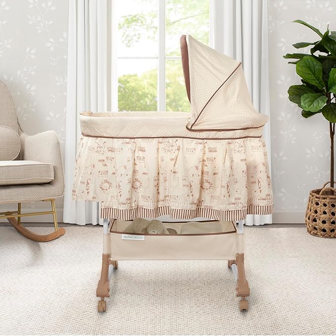 Delta Children Portable Rocking Bassinet for Newborns Bedside Sleeper Crib with Gentle Vibrations, Nightlight, Soothing Music, Adjustable Canopy, Plush Toys, Storage Basket, Baby Essentials