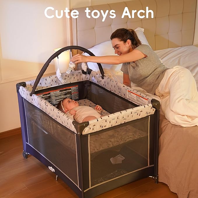 Pamo Babe Portable Playard,Sturdy Play Yard with Padded Mat and Toy bar with Soft Toys