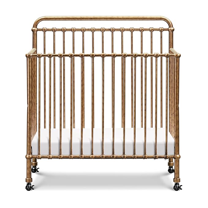 NAMESAKE Winston 4-in-1 Convertible Mini Crib w/Removable Wheels - Converts to Toddler Bed, Daybed & Twin-Size Bed - GREENGUARD Gold Certified - 4 Adjustable Heights - Durable Metal, Easy to Assemble