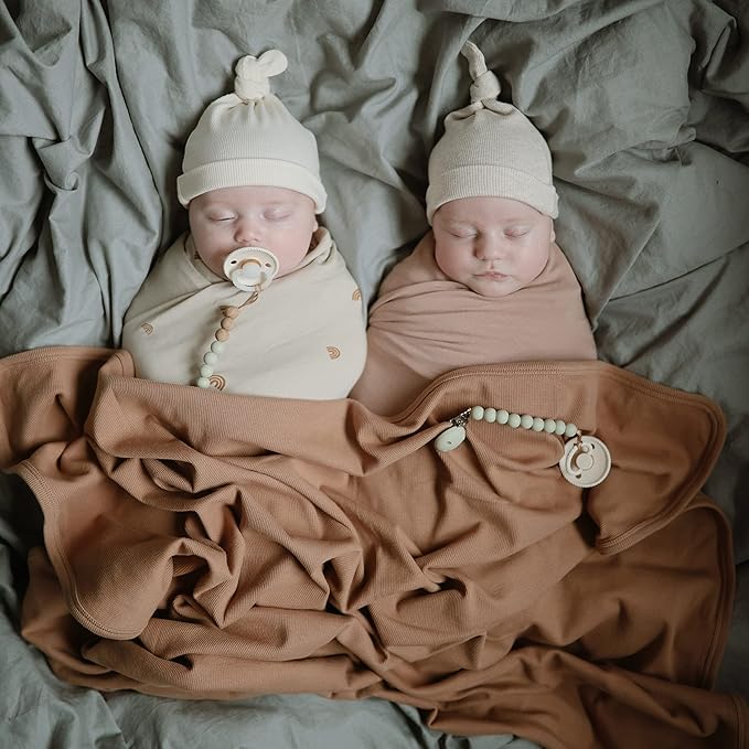 mushie Stretchy Baby Swaddle Blanket | Extra Soft & Snug Fit | 47"x47" (Blush)