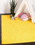 Unique Loom Solid Shag Collection Area Rug (5' 1" x 8' Rectangle, Tuscan Sun Yellow)
