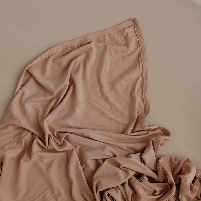 mushie Stretchy Baby Swaddle Blanket | Extra Soft & Snug Fit | 47"x47" (Blush)